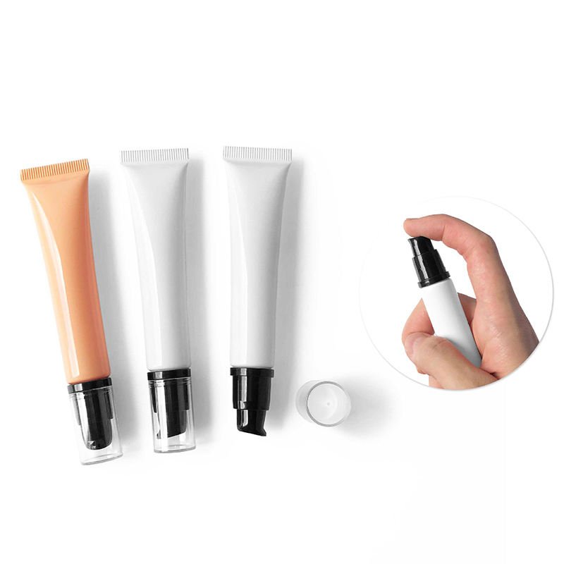 White cosmetic tube with pump dispenser for skincare lotion packaging on clean background